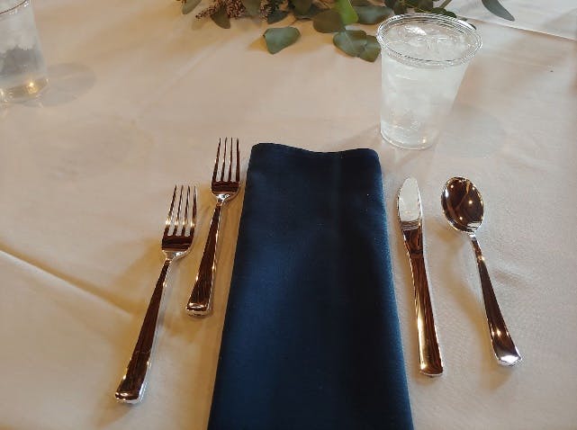 a glass cup on a table