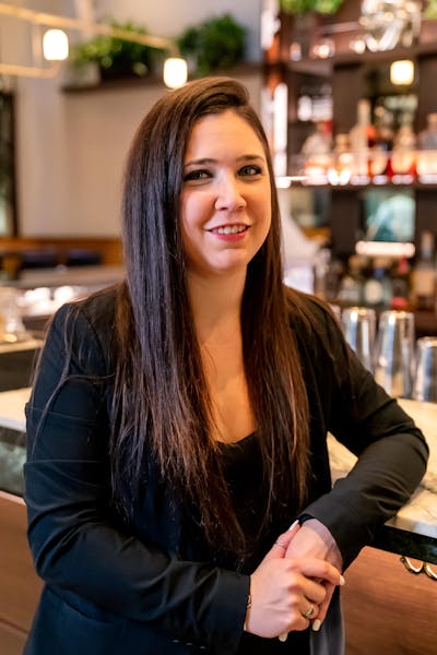 a woman smiling for the camera