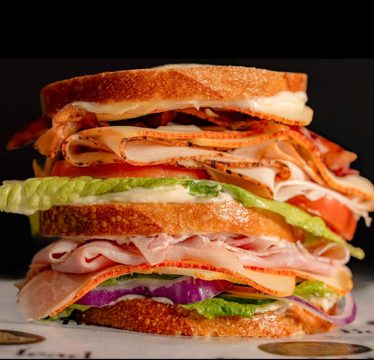 a sandwich cut in half on a plate