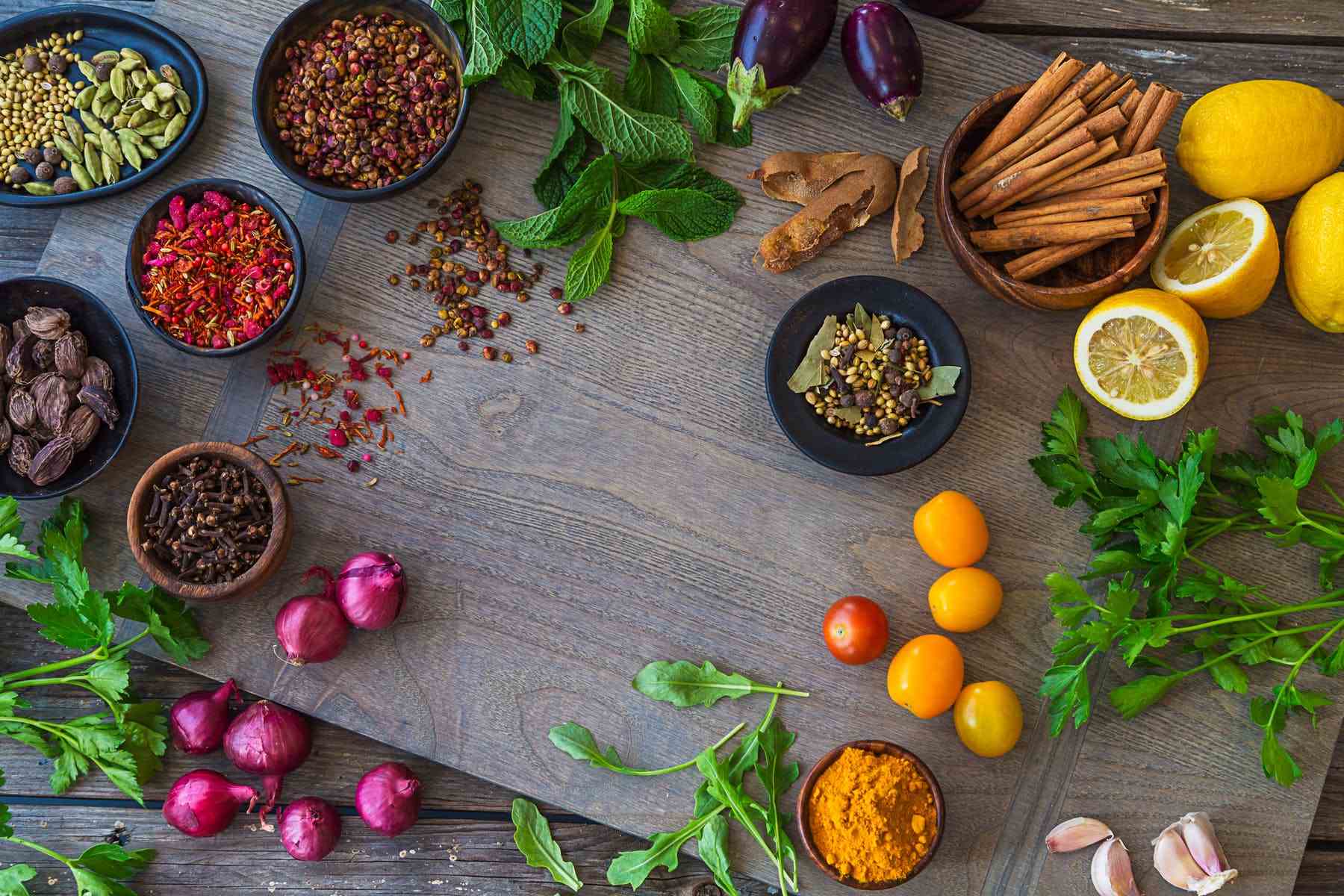 a table with various spices and herbs