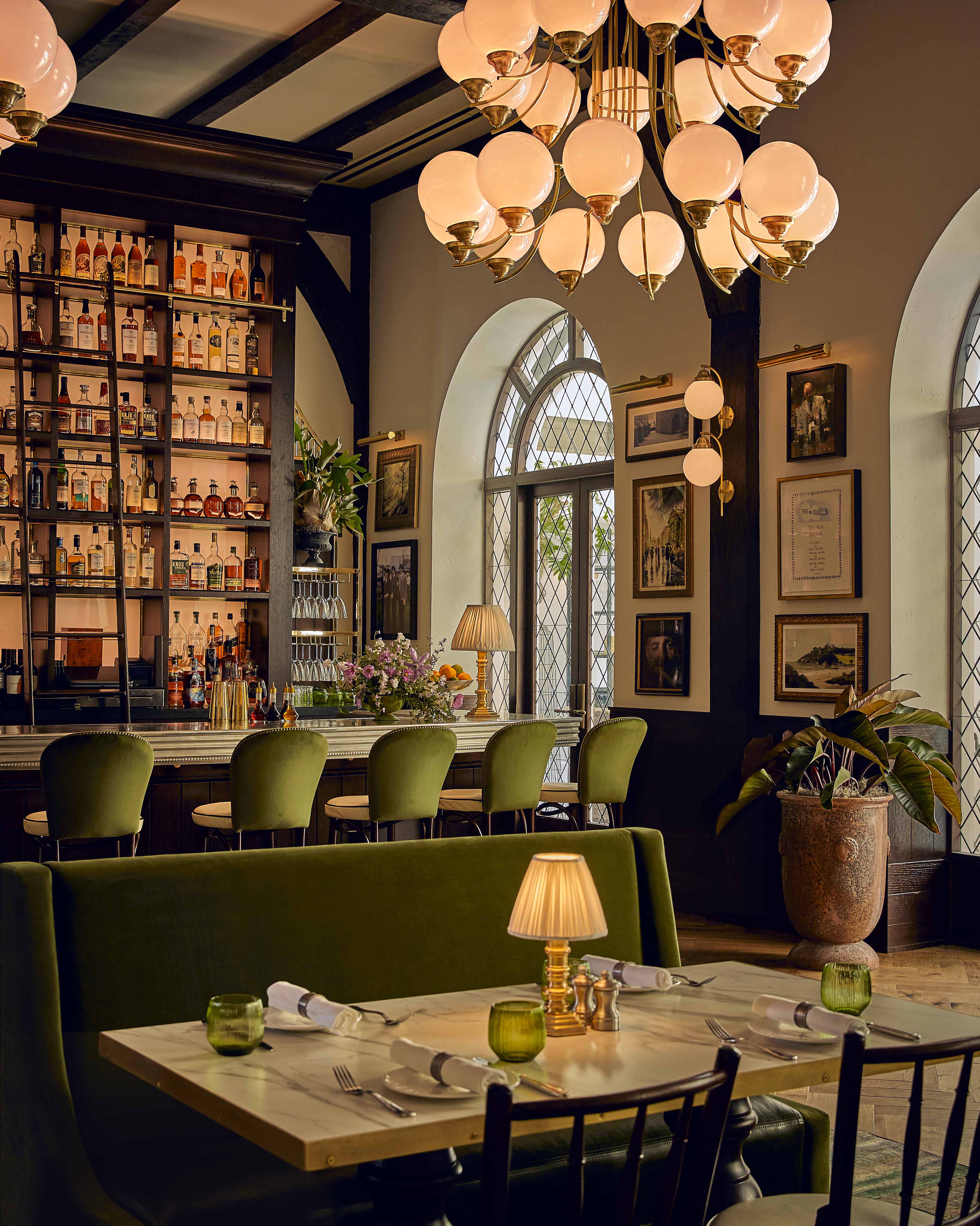 a restaurant with a bar and a table
