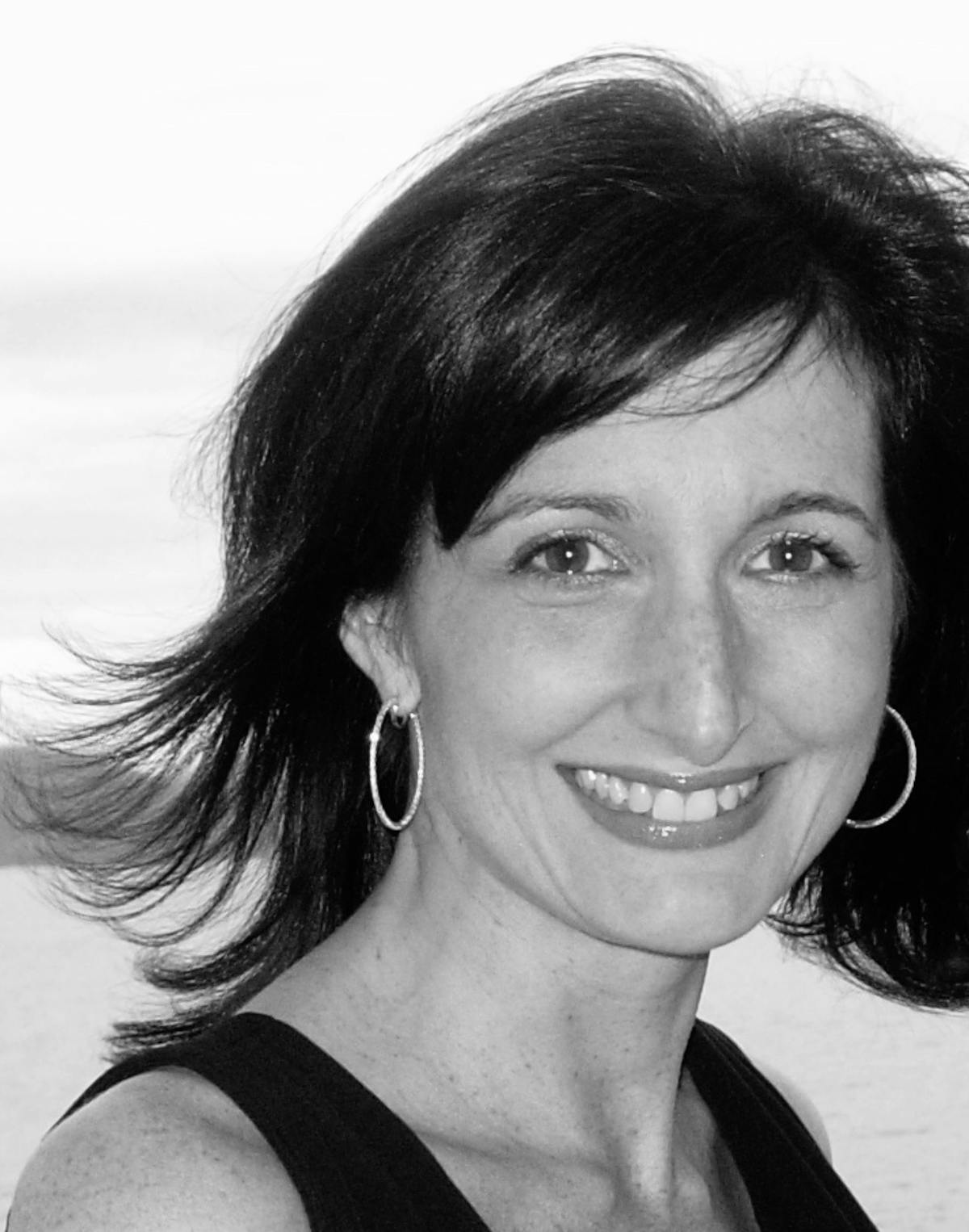 a woman smiling for the camera