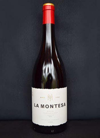 a close up of a bottle of wine