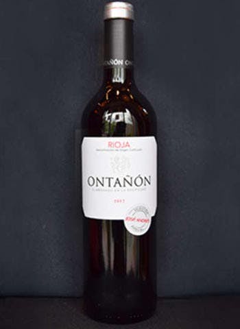 a close up of a bottle of wine