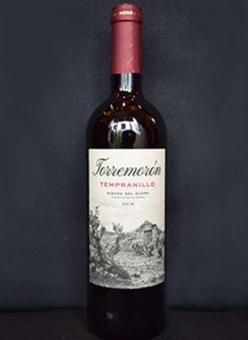 a close up of a bottle of wine