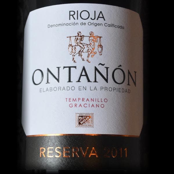 a close up of a bottle of wine