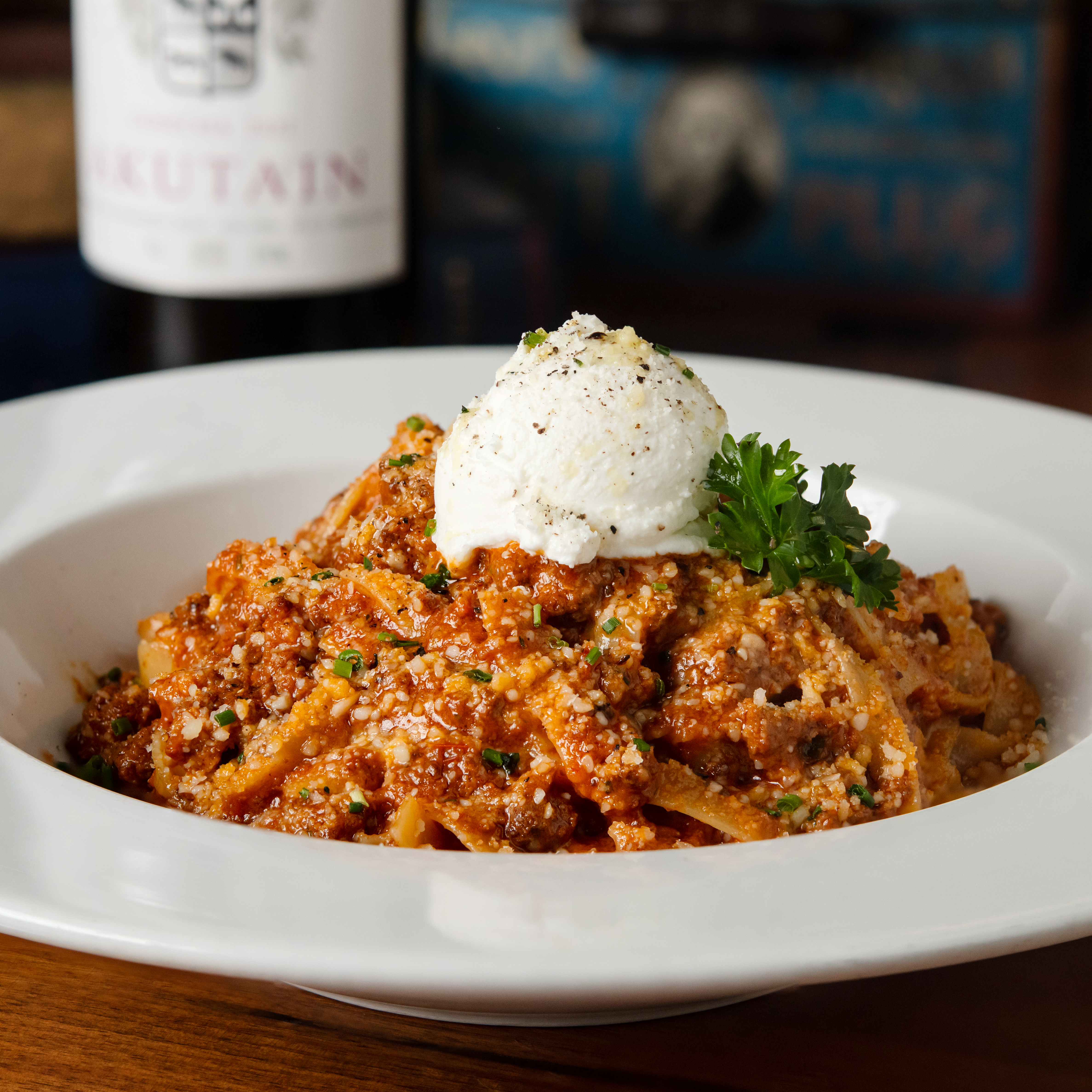 a plate of food with rice meat and vegetables