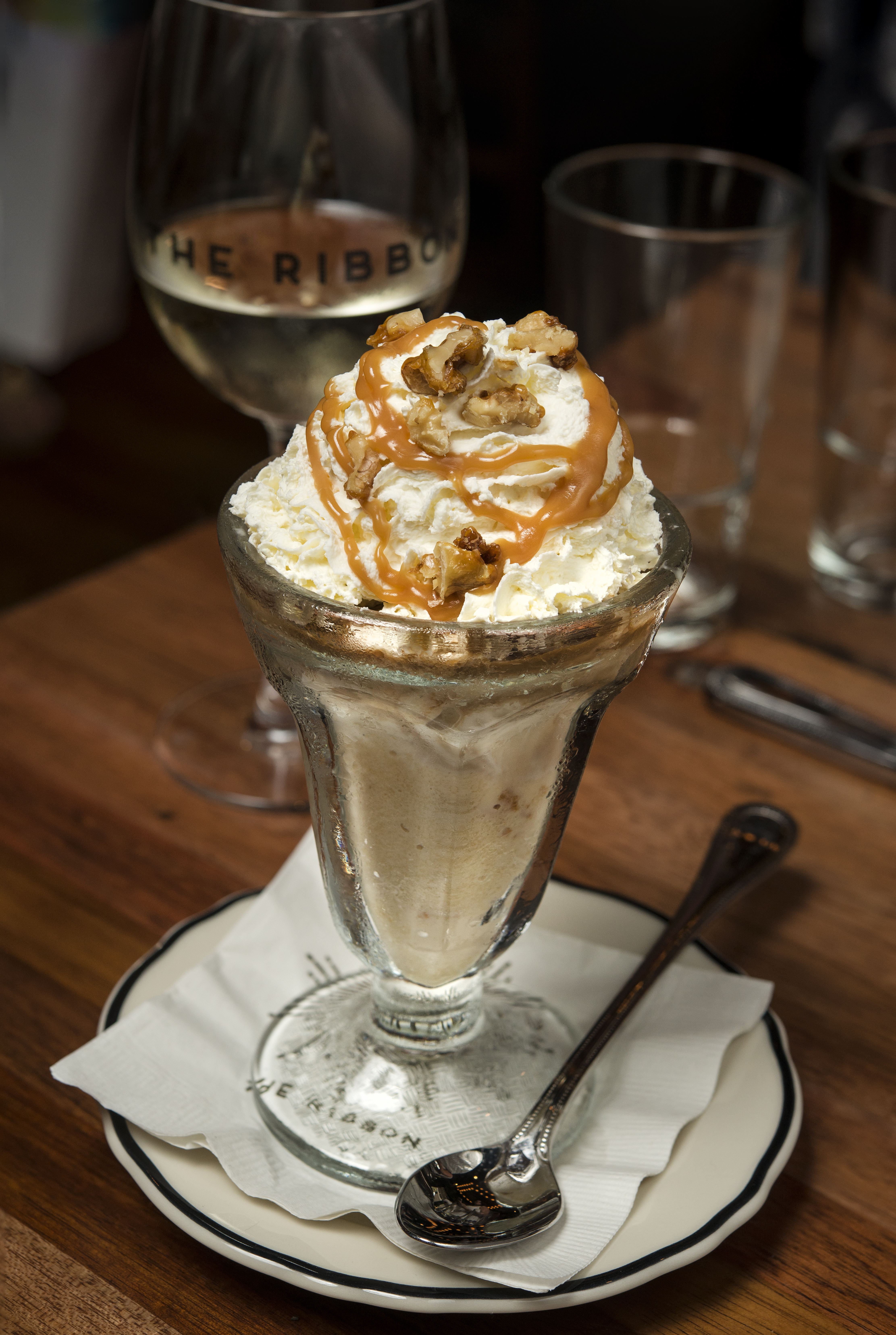 a glass cup on a plate