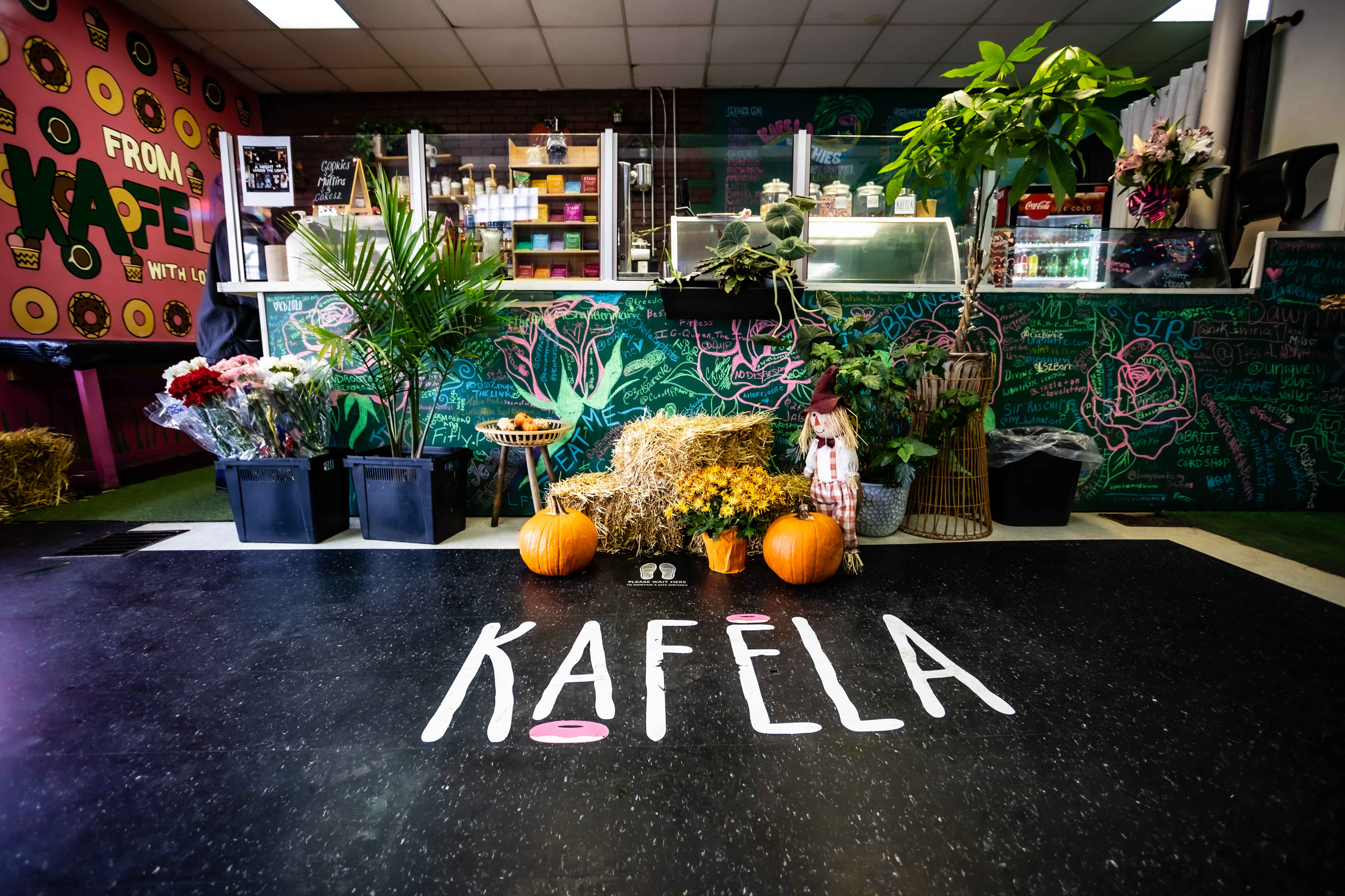 The interior front of Kafela with the title Kafela on the carpert