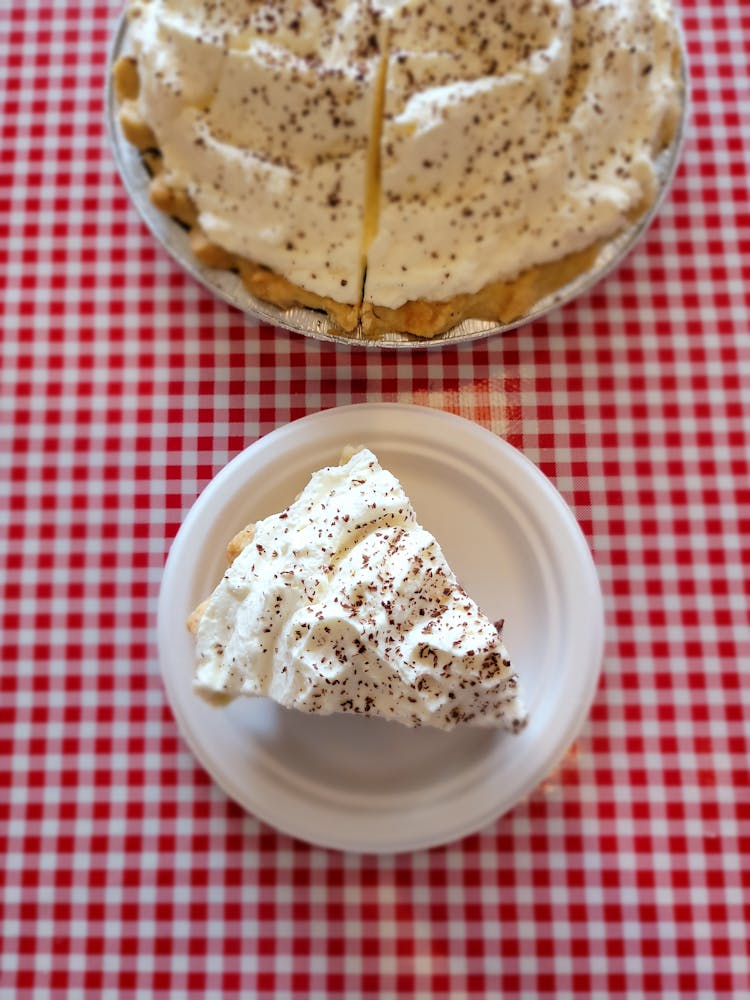 a half eaten piece of cake on a plate