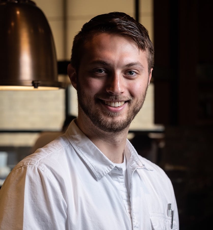 a man smiling for the camera