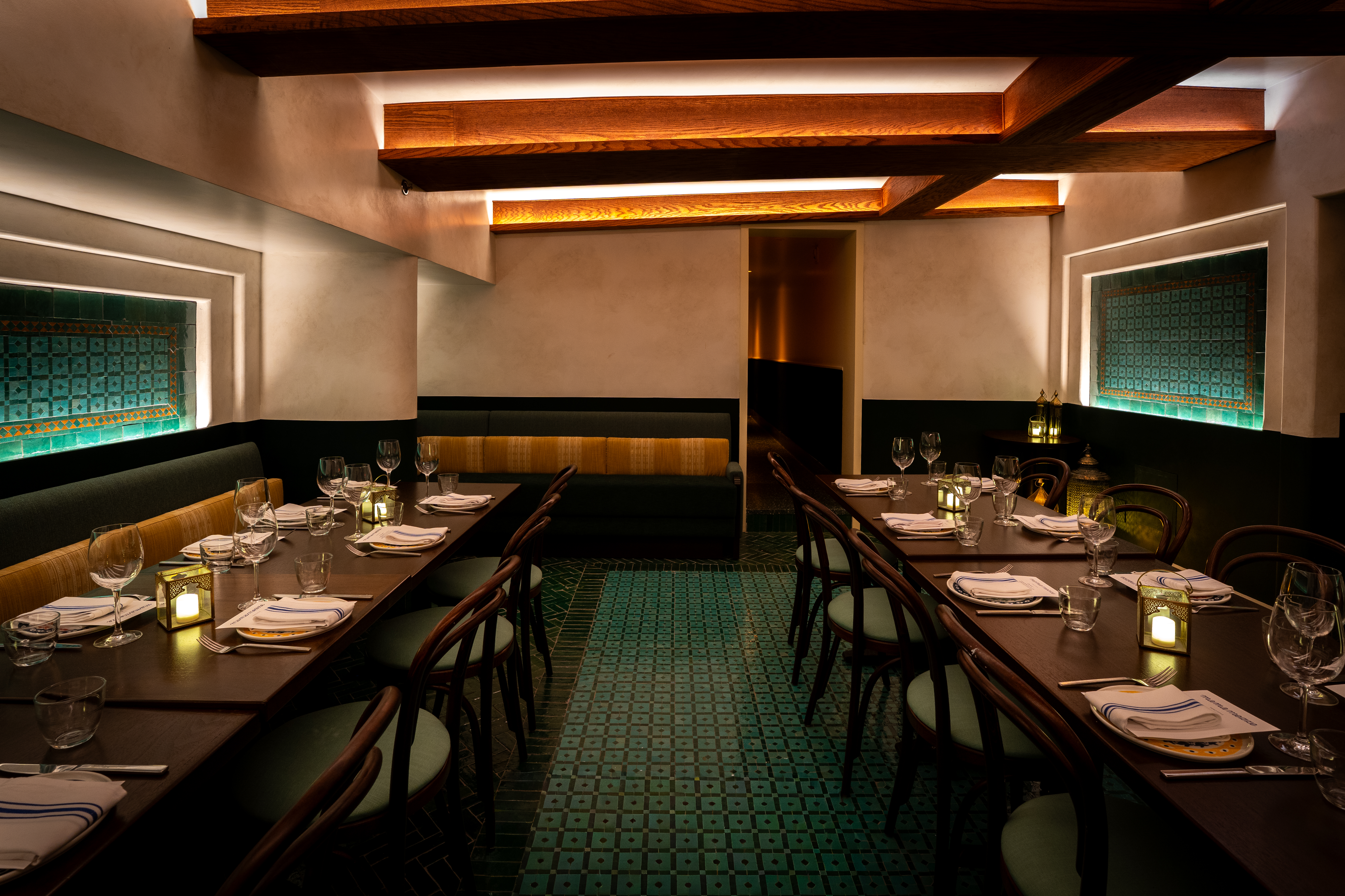 a kitchen with an island in the middle of a room