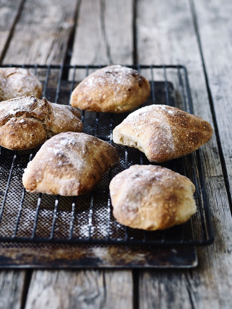 several pieces of bread on a grill