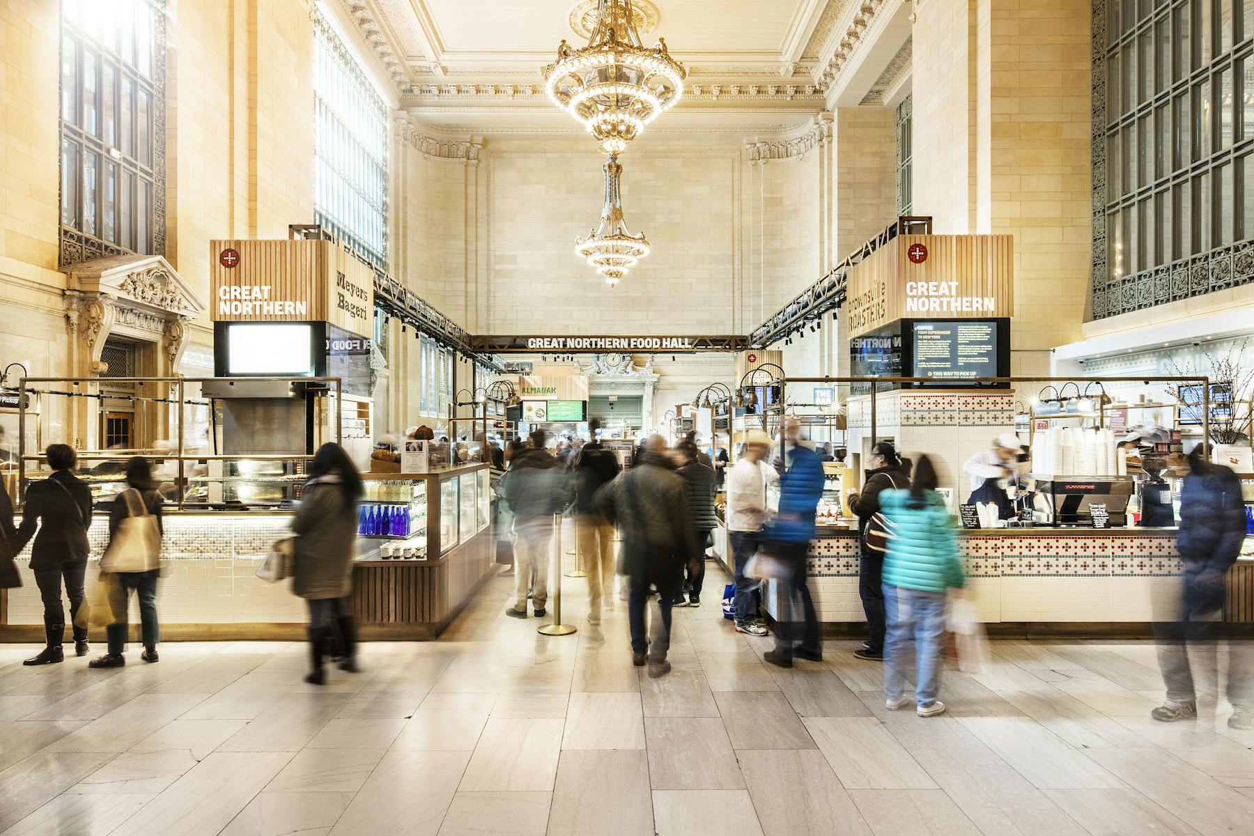 A group of people in a hall
