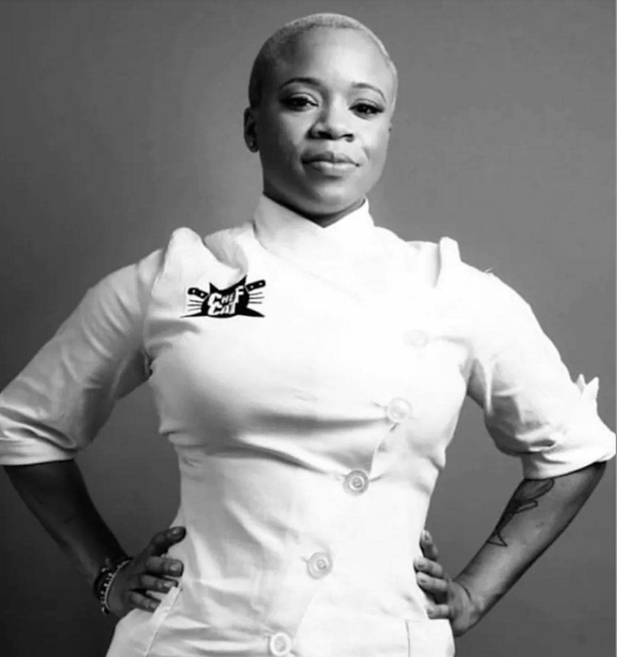 a person standing posing for the camera