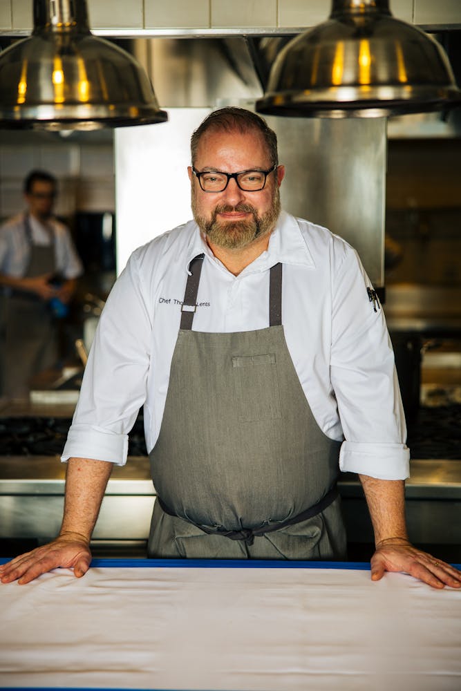 a man sitting on a counter