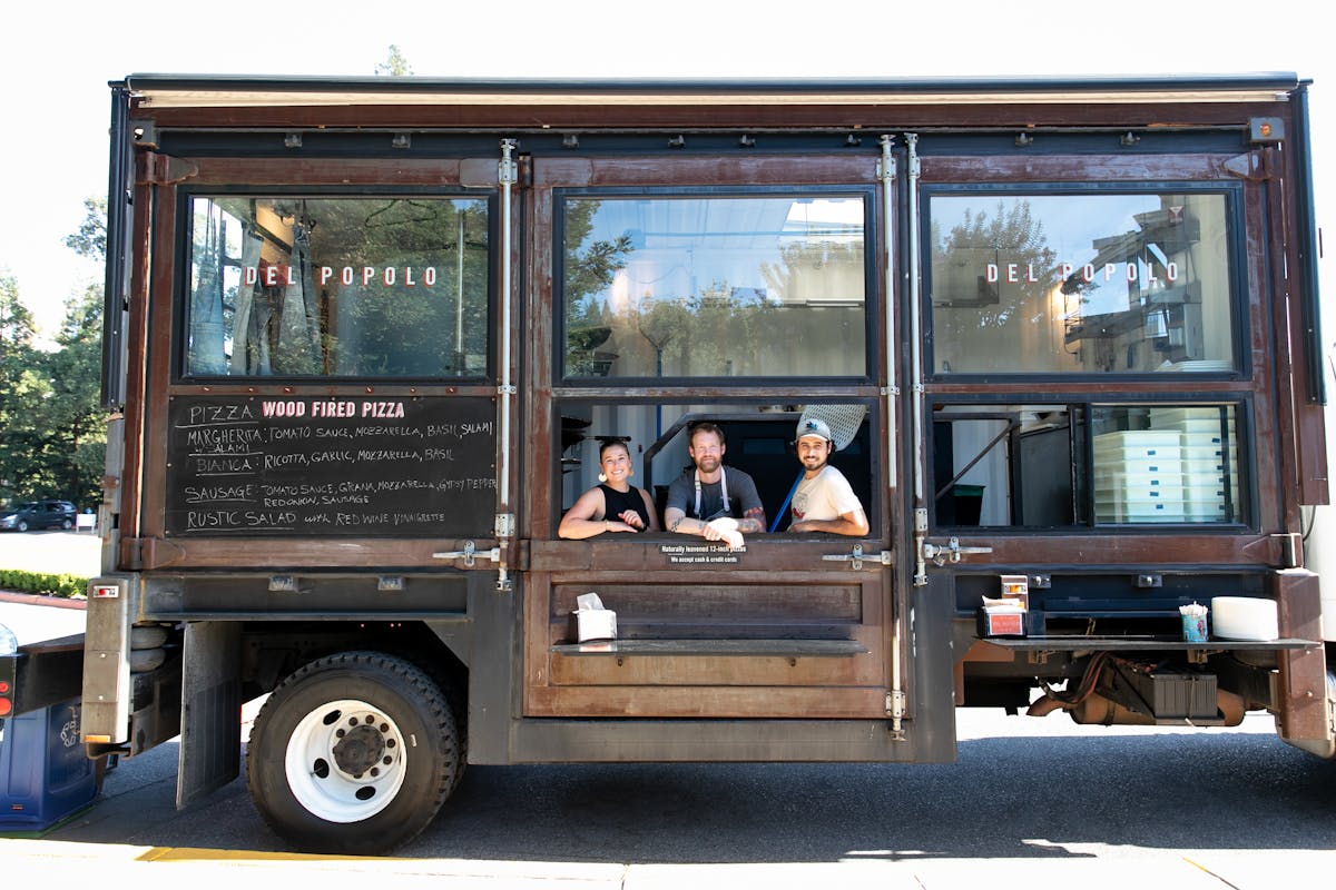 people inside of the food truck