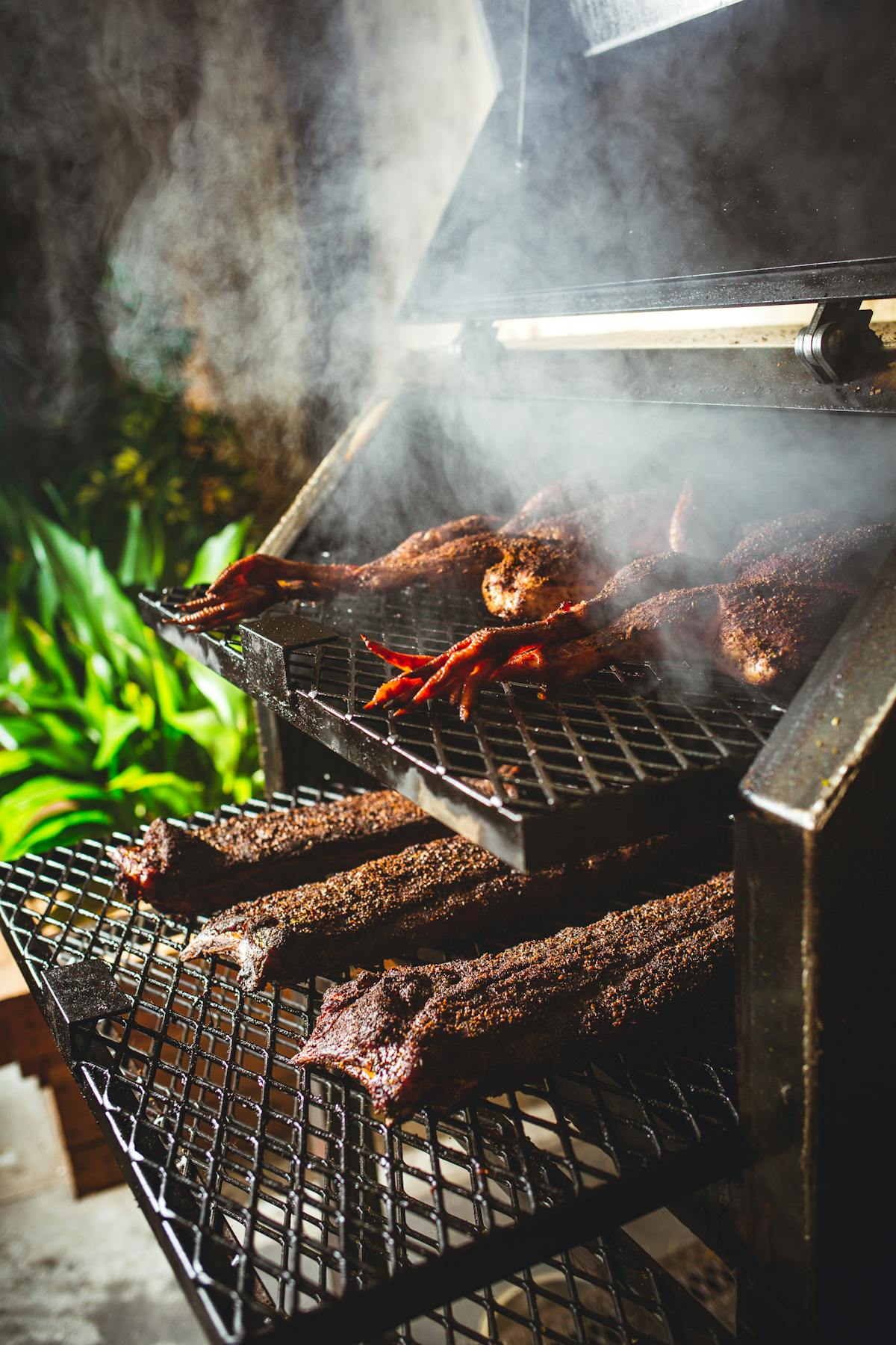 chicken cooking on a grill