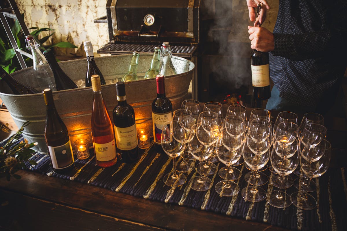 bottle of wine and glasses on a table 