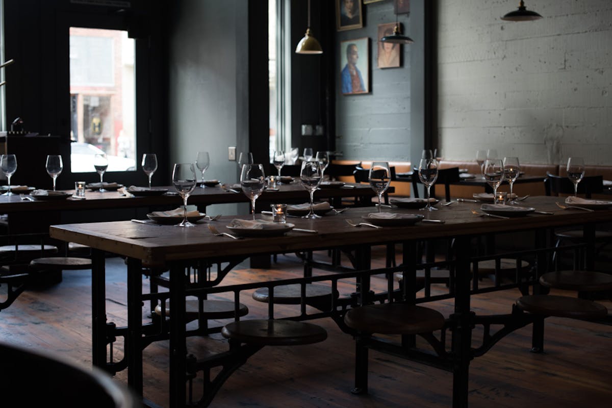 a room filled with dinning tables