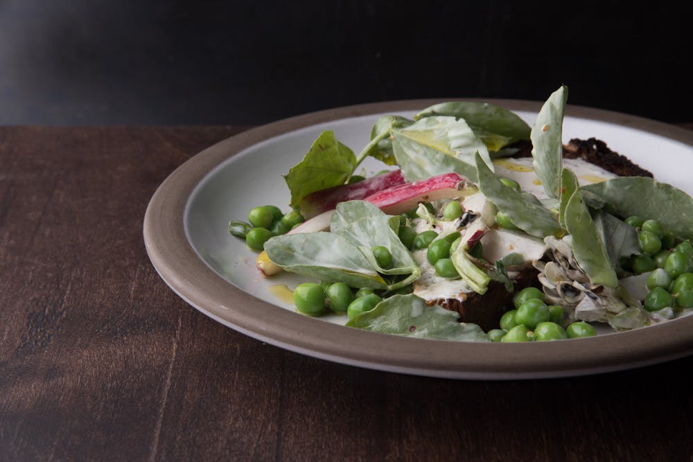 a bowl of salad on a plate