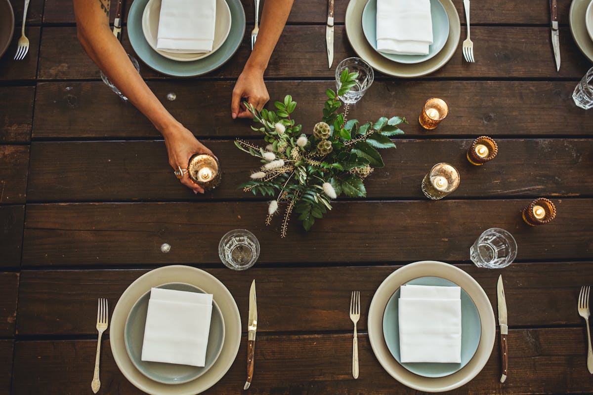 a table with the plates set 