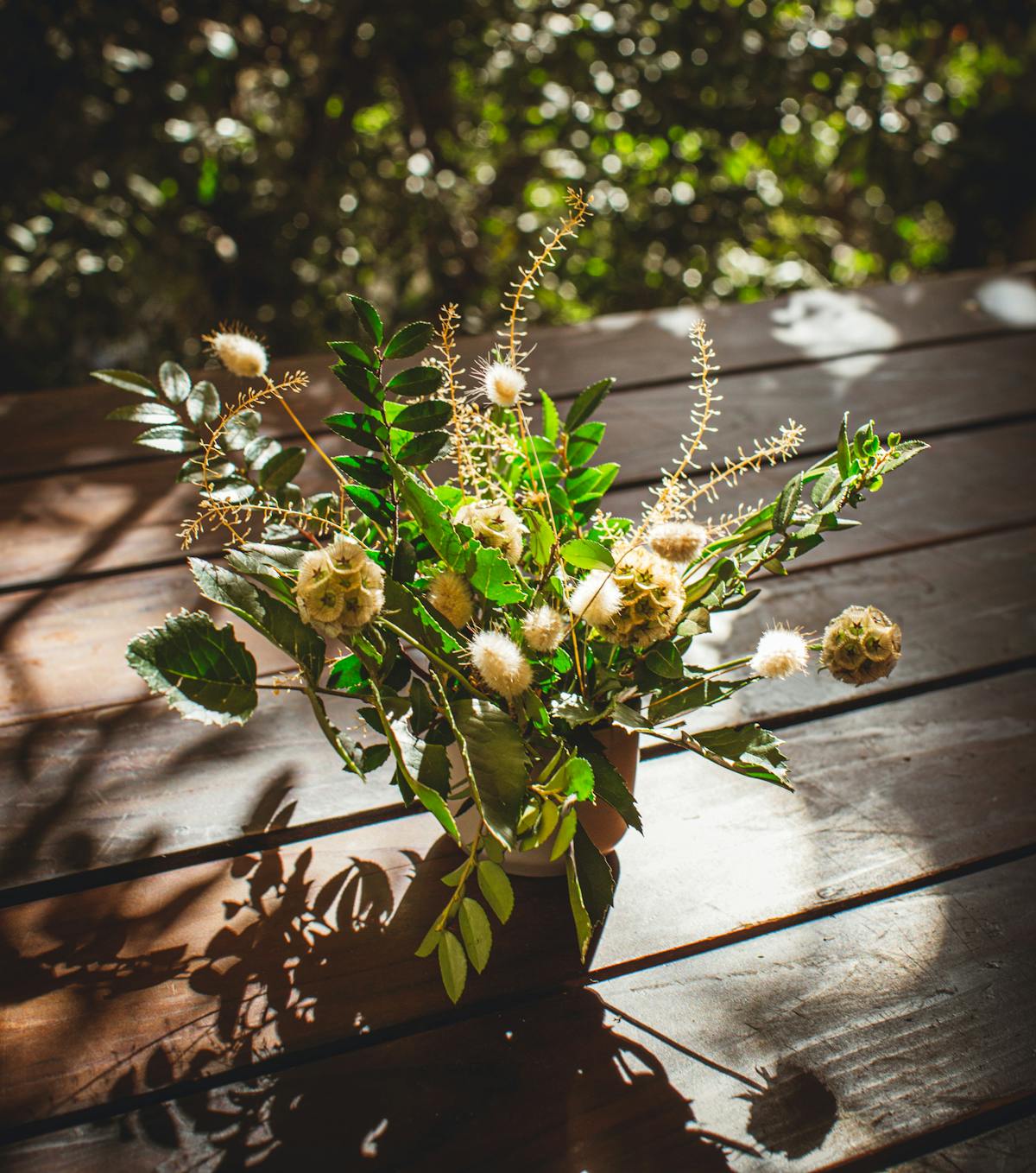 a vase of flowers on a table