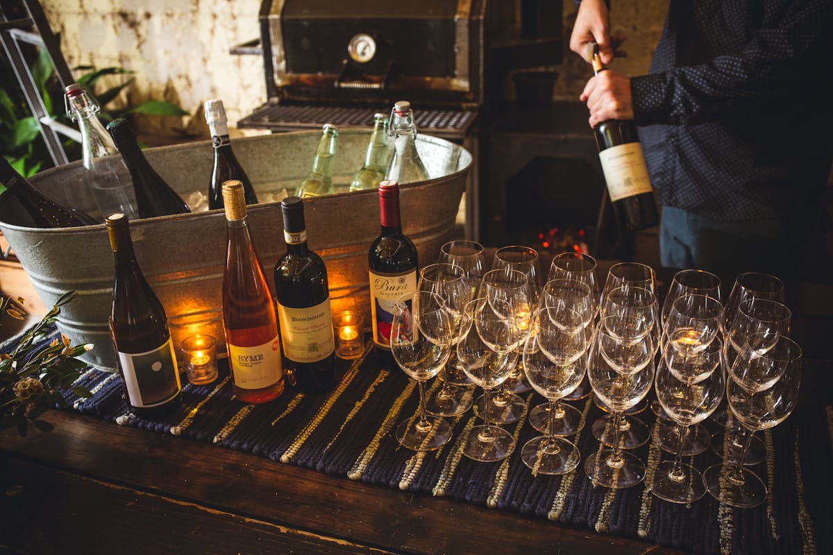 bottles of wine and glasses on a table