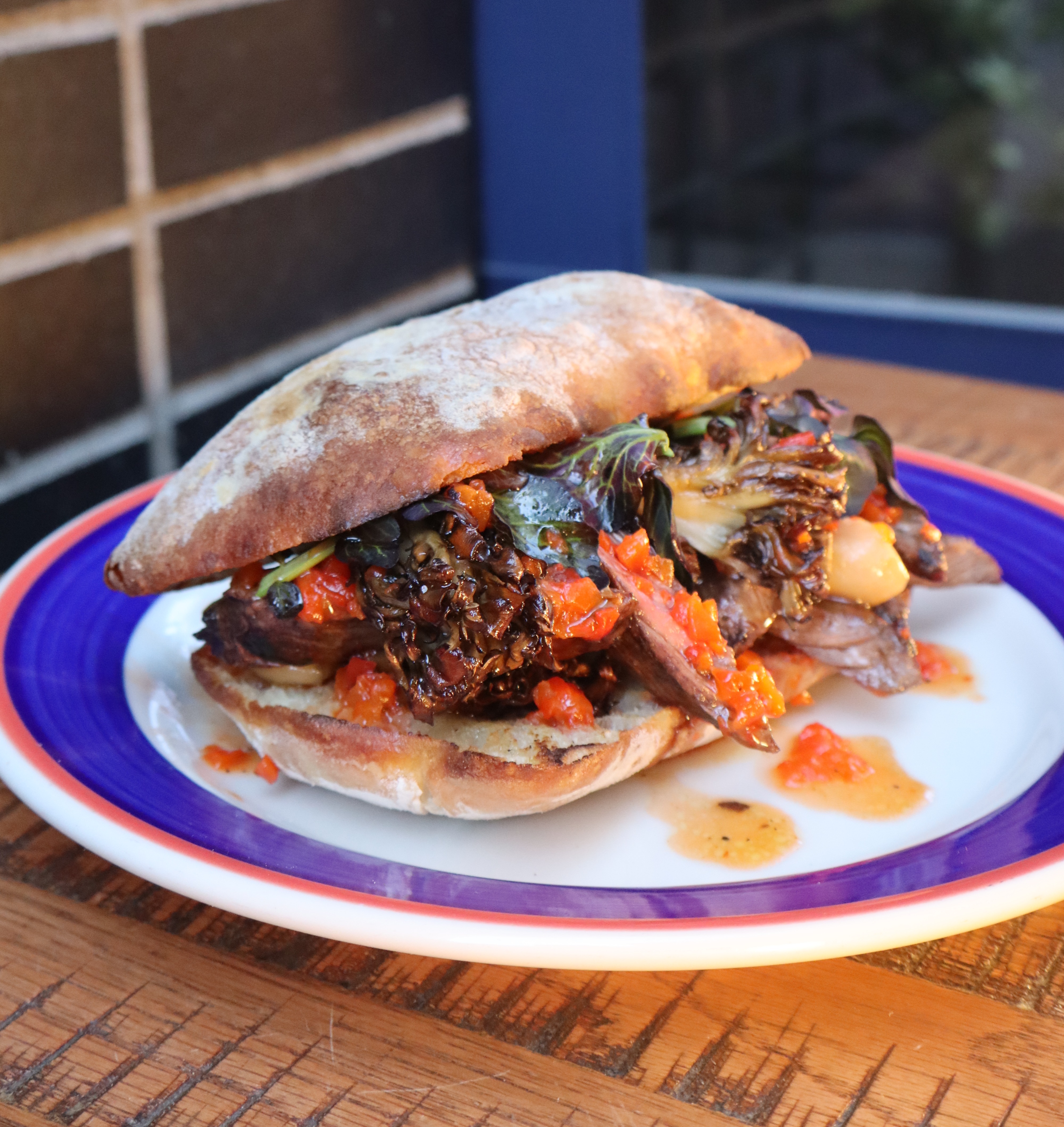 a sandwich on a blue plate