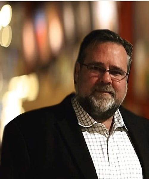 a man wearing glasses