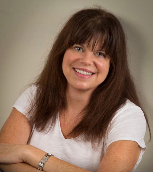 a person smiling for the camera