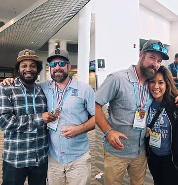 a group of people posing for the camera