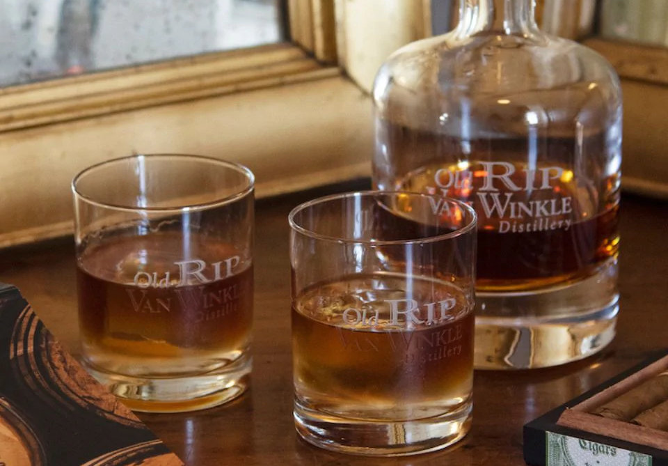 a glass of beer on a table