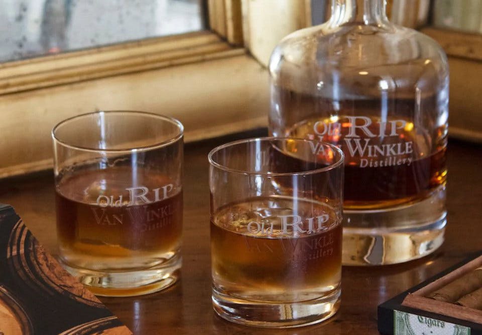 a glass of beer on a table