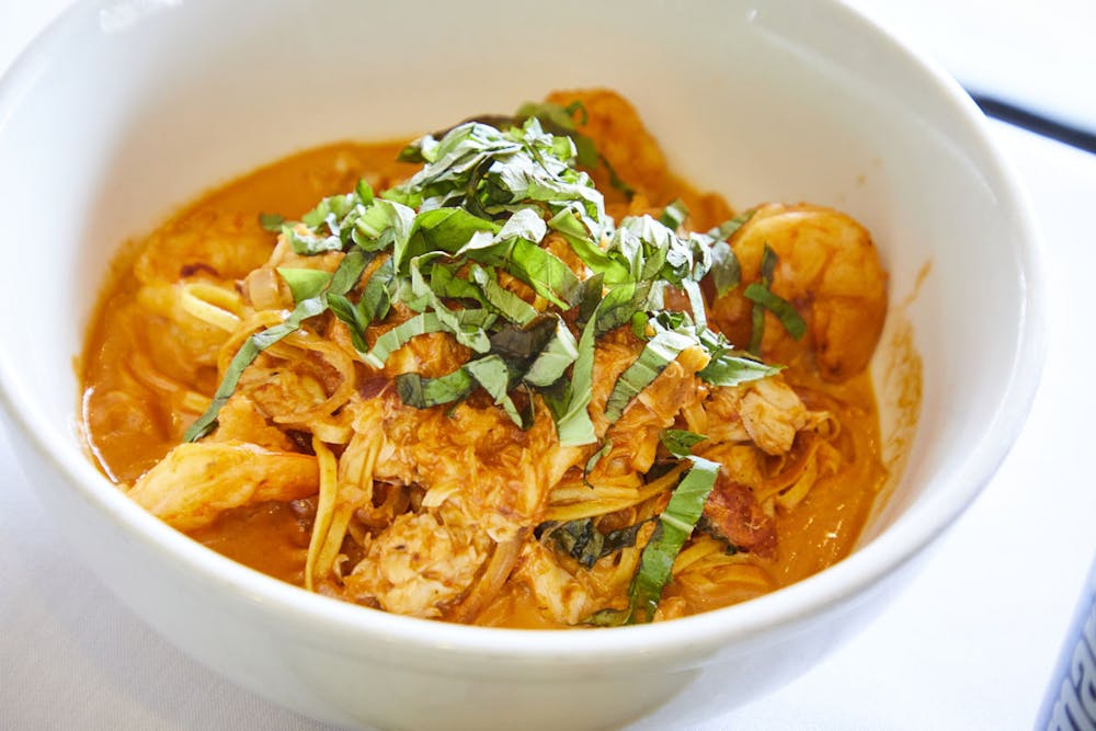 a close up of a bowl of food on a plate