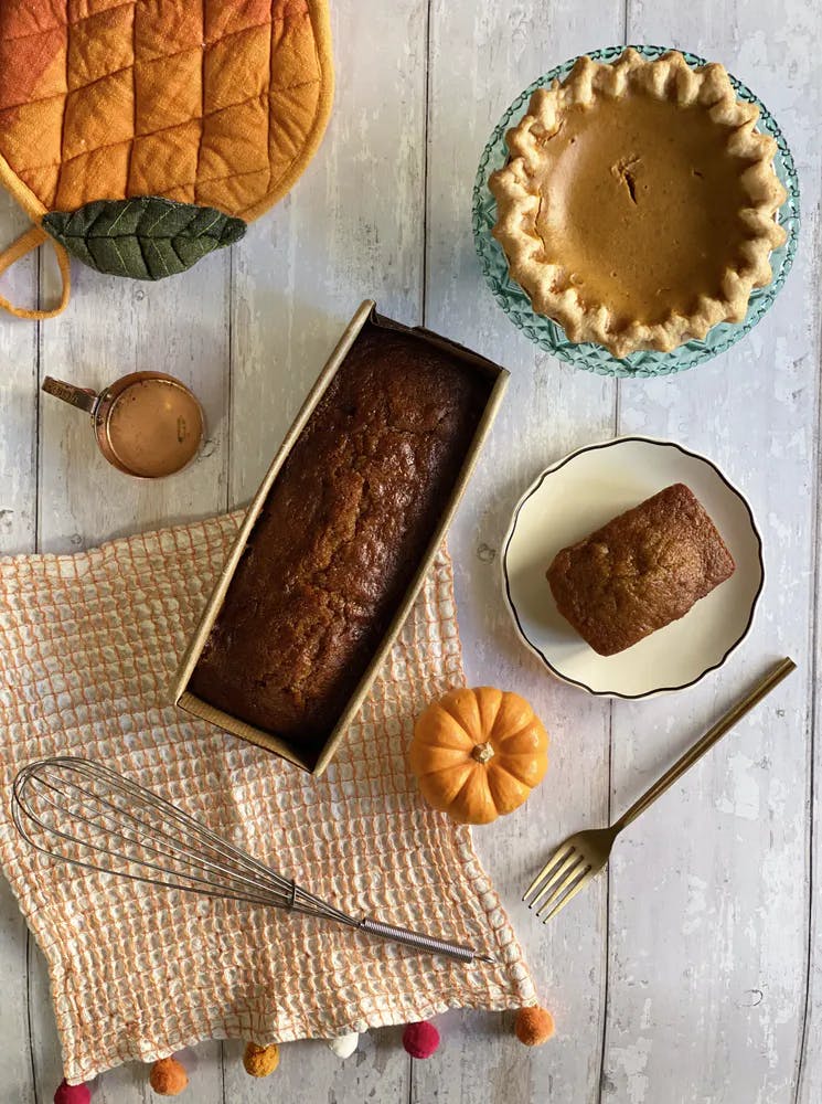 pumpkin pie and tea breads on a table
