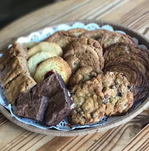 a platter of cookies and brownies