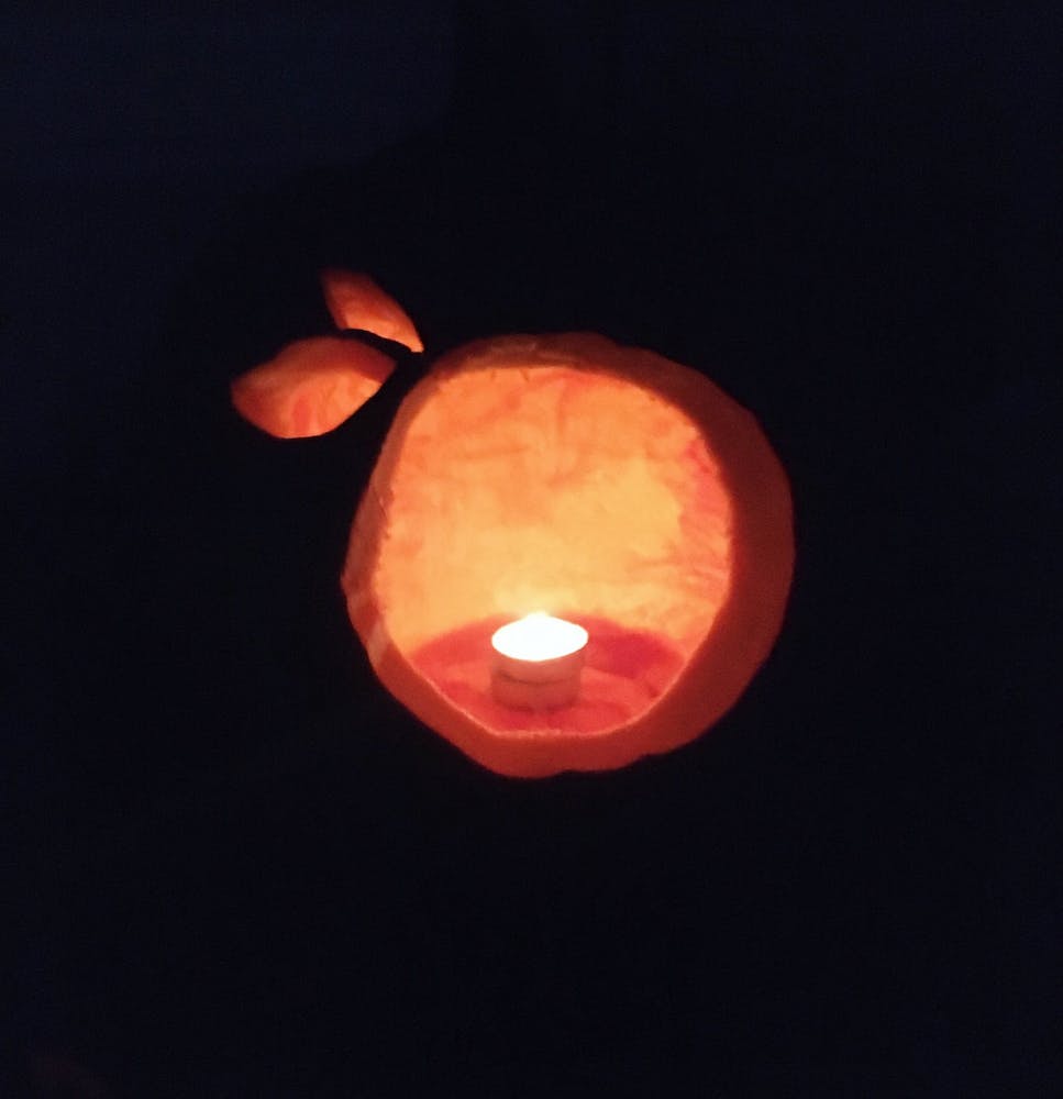 clementine shaped jack o lantern