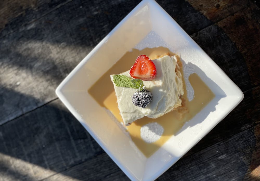 a piece of cake sitting on top of a wooden table