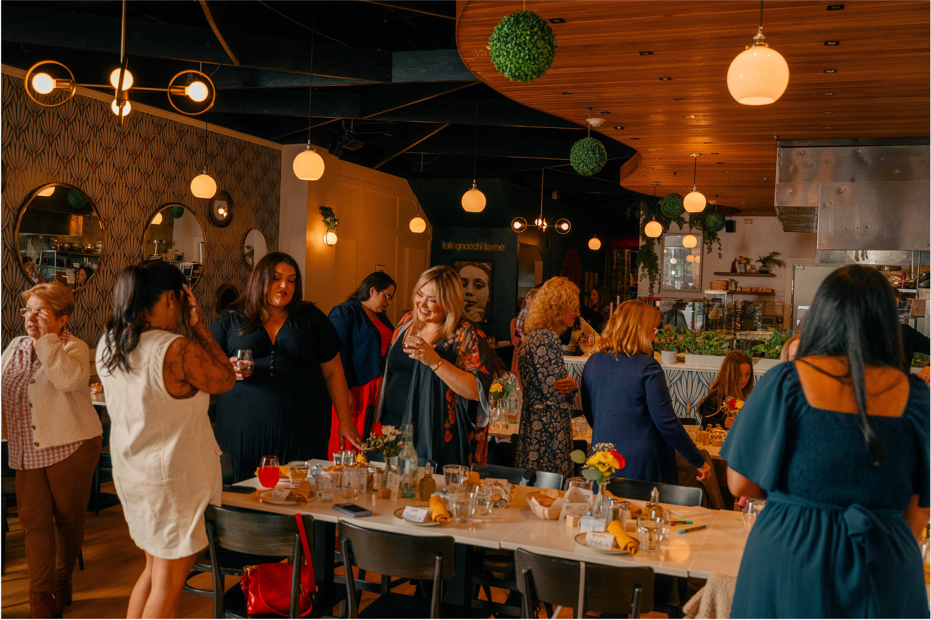 a group of people preparing food in a restaurant