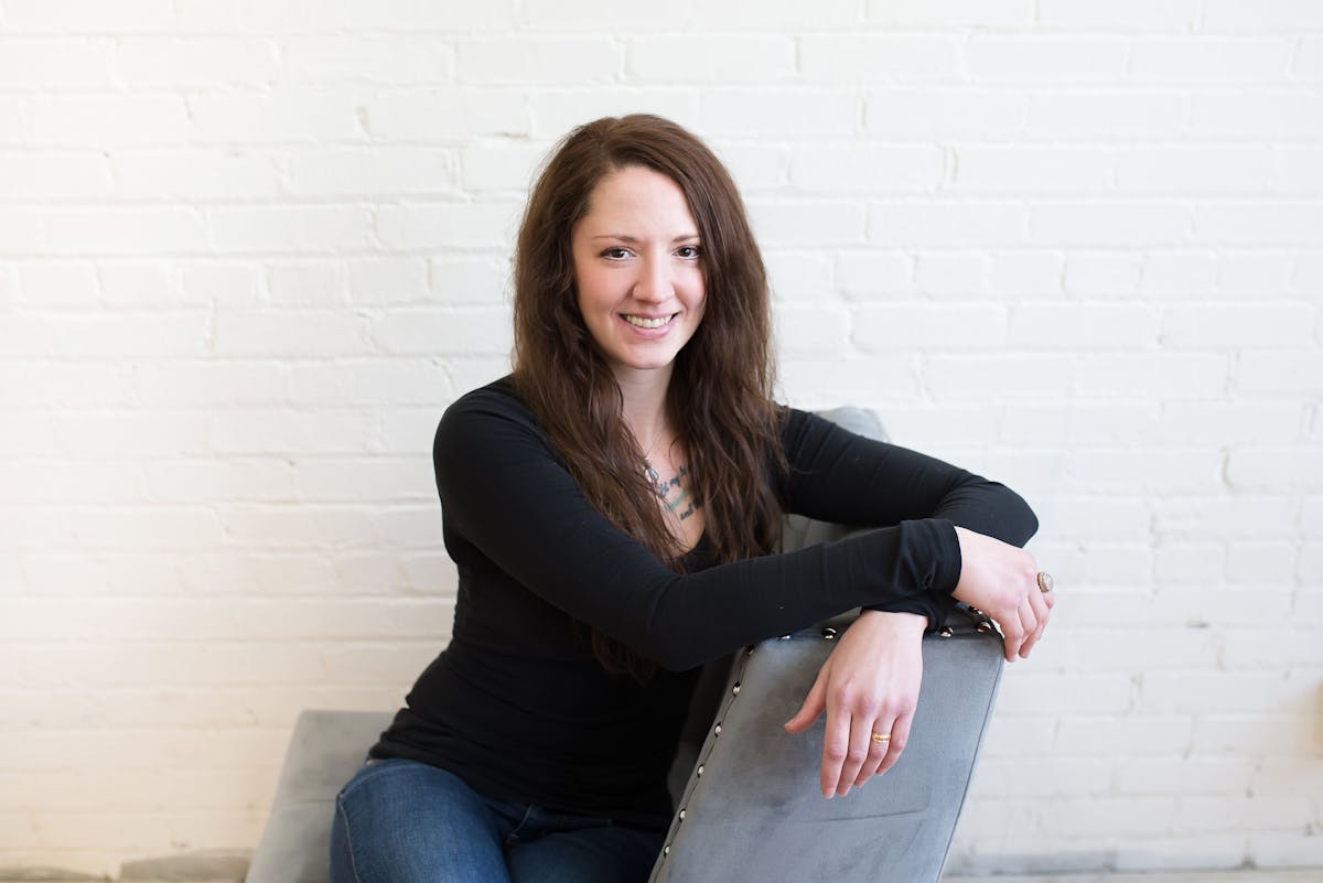 a woman sitting in a chair