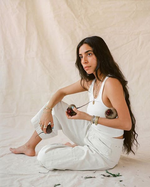 Bianca Valle in a white dress