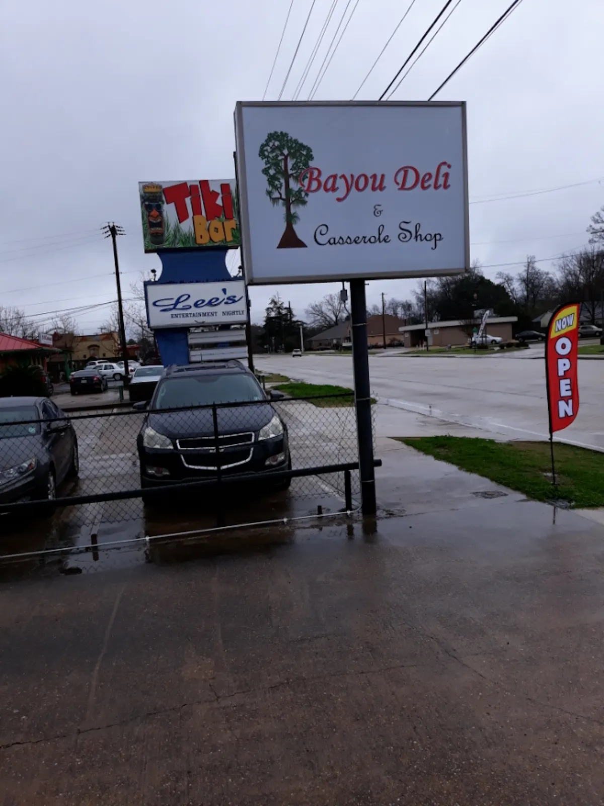 a sign on the side of the street