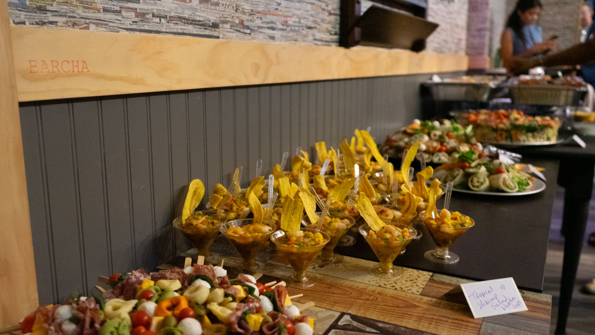 a bunch of food sitting on top of a wooden table