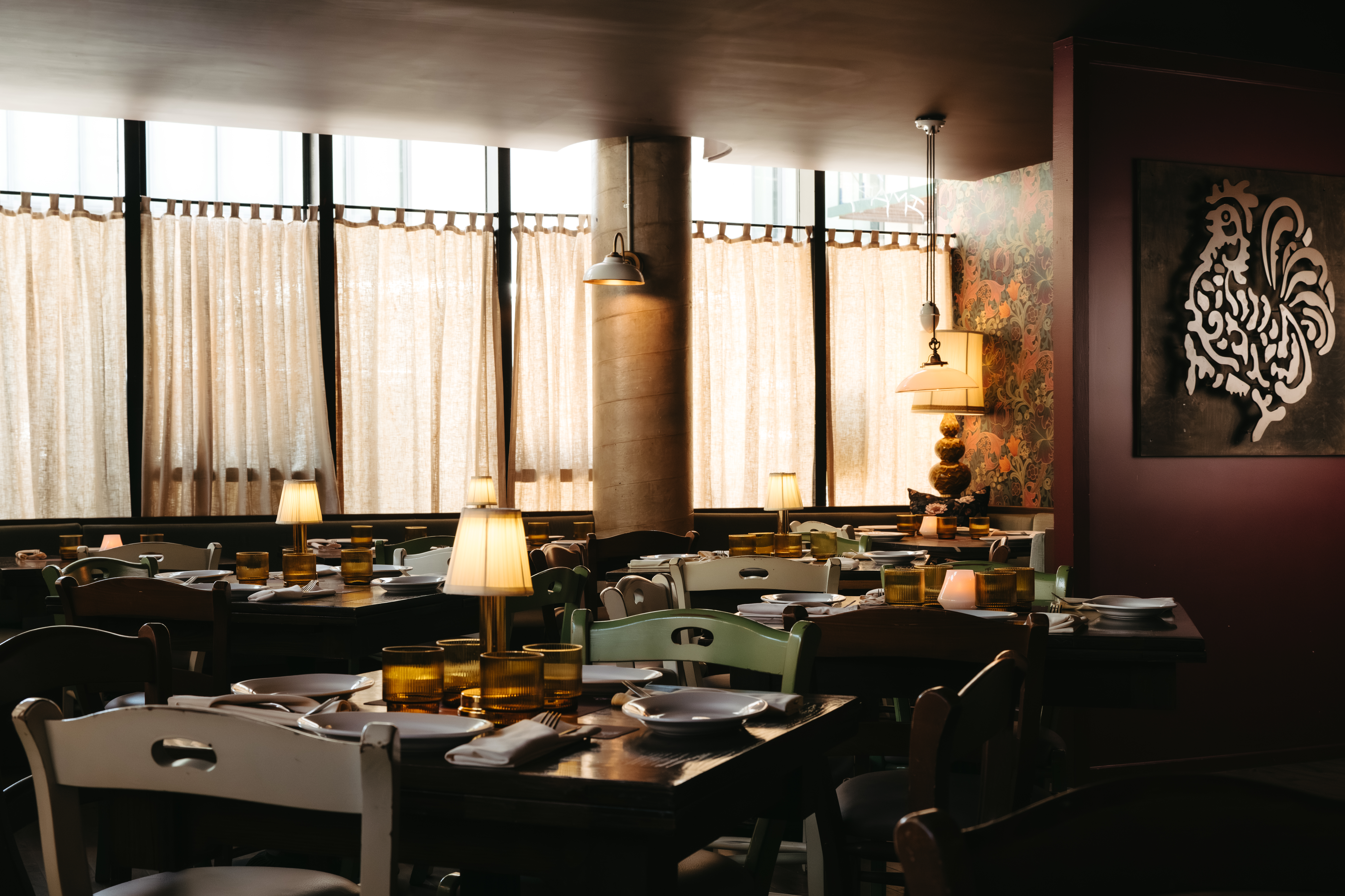 a room with tables and chairs