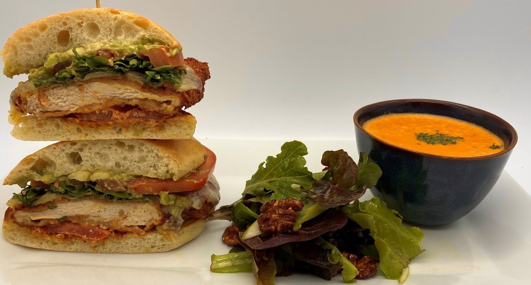 a sandwich cut in half on a plate