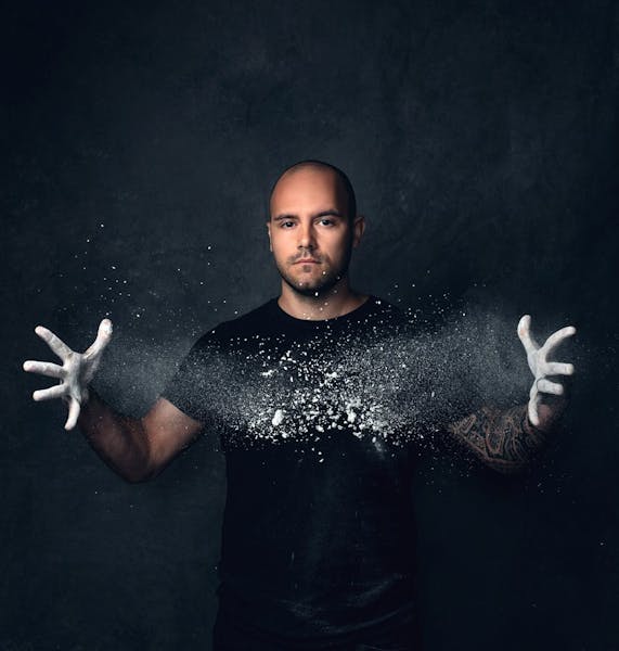 a person standing in front of water