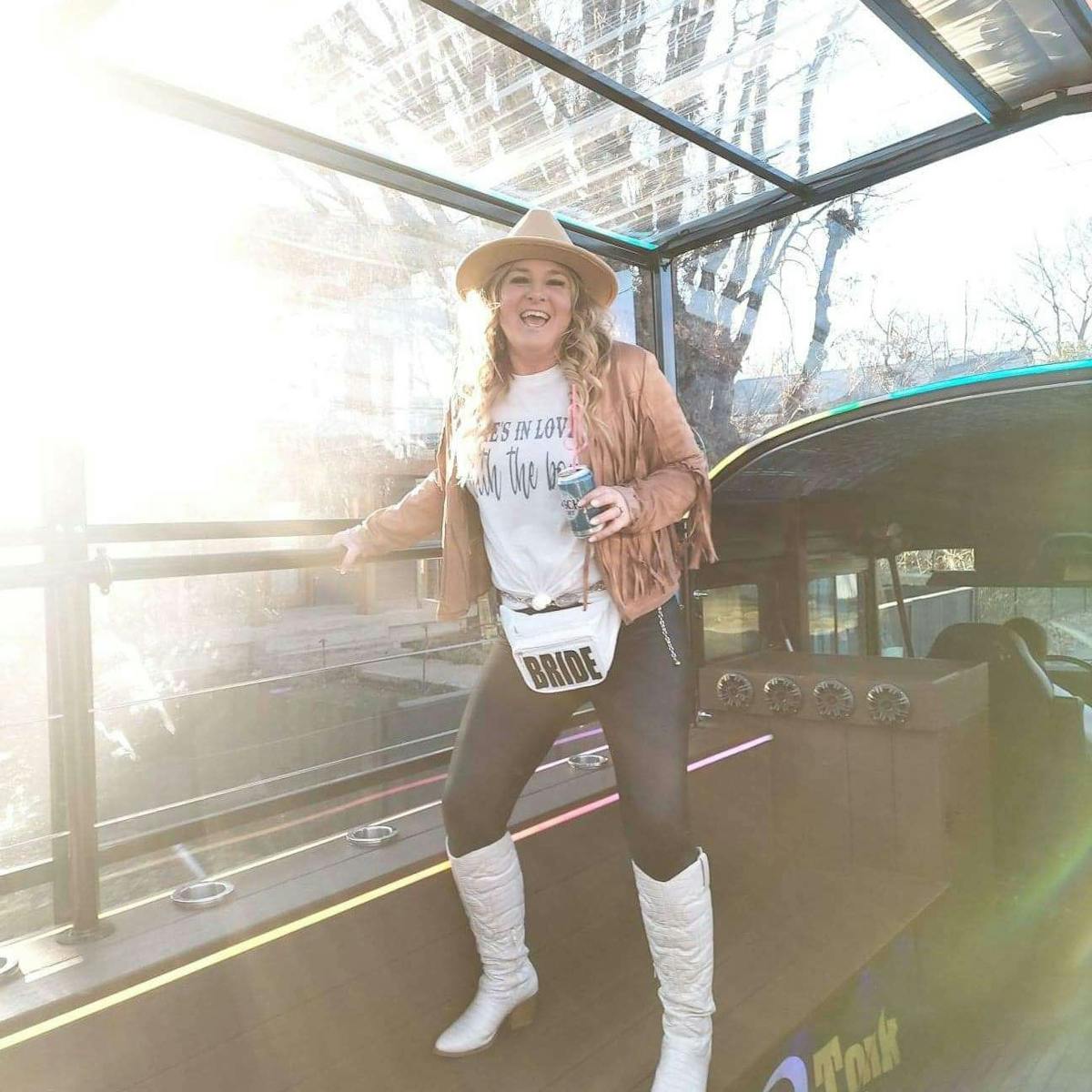 a woman standing on a bridge