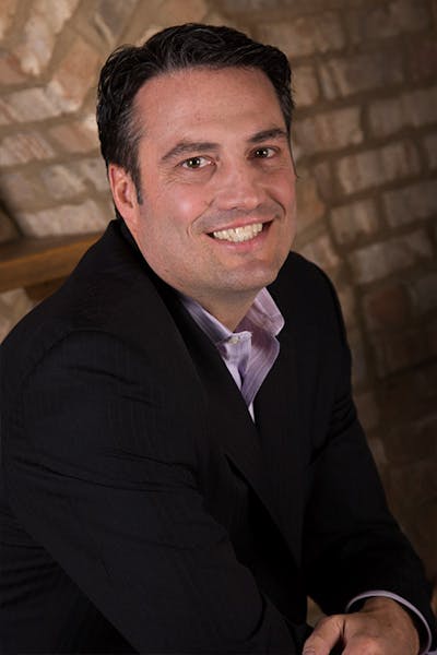 a man wearing a suit and tie