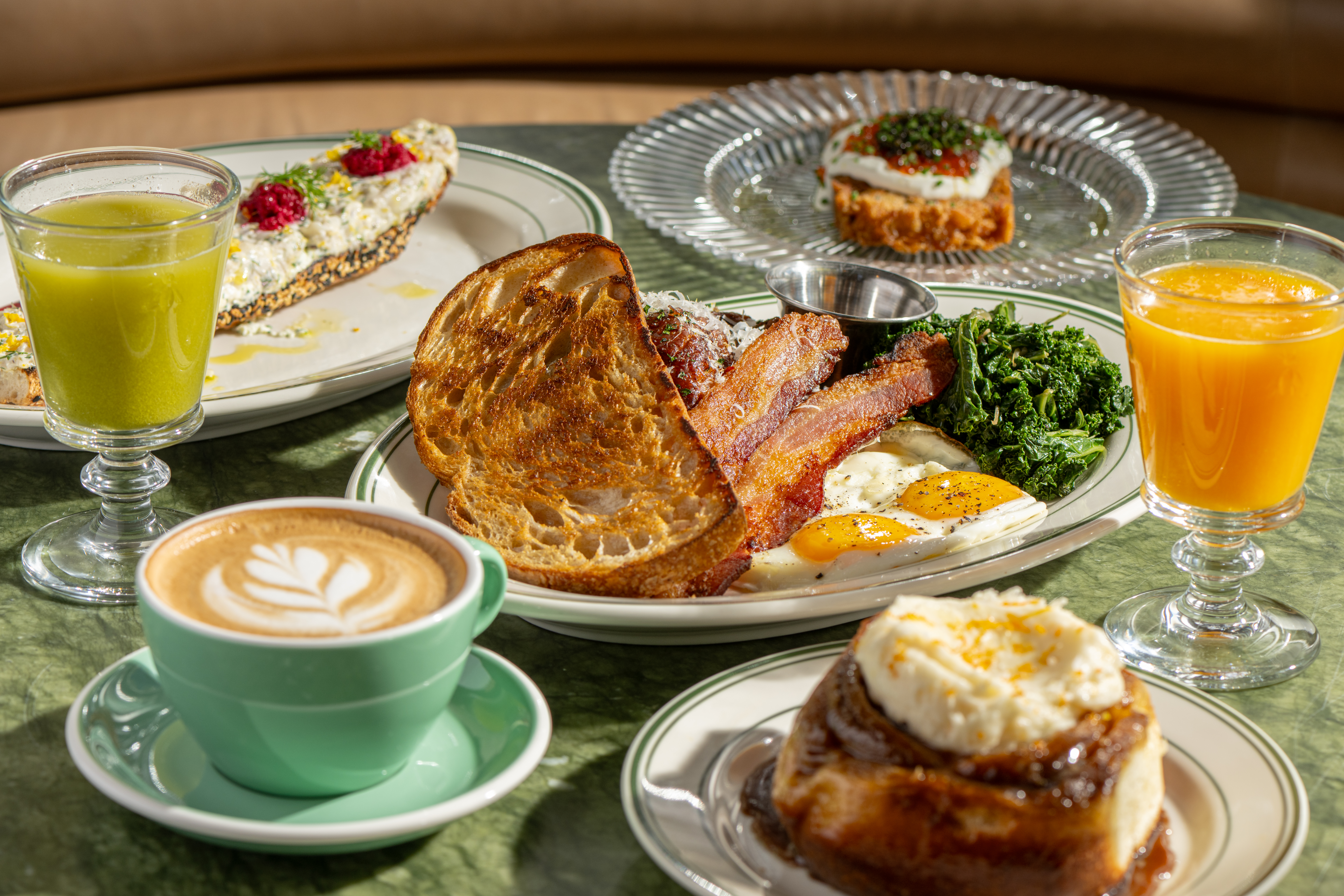 a group of plate of food on a table